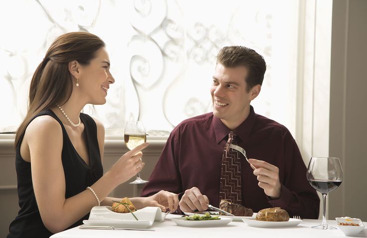 A couple enjoying a meal together